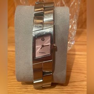 Pink face fossil watch